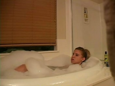 Sexy blonde babe masturbating in bubble bath on hidden cam